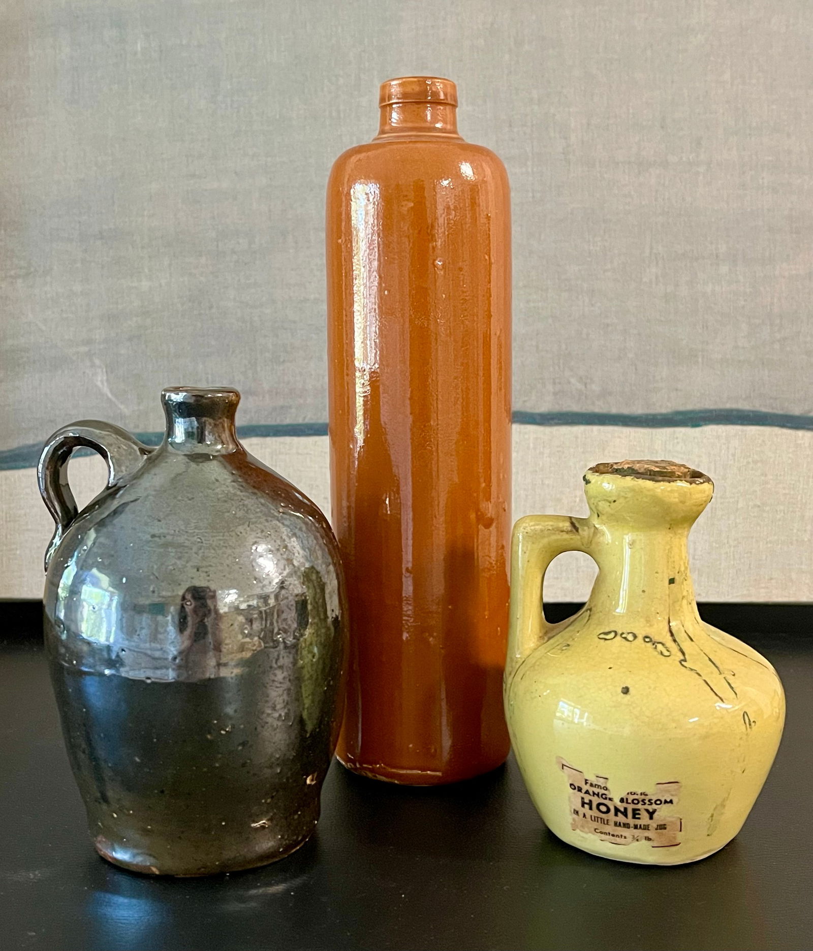 Lot Of 3 Vintage Pottery Jugs - Rustic Farmhouse Decor Primitive Decor: This is a charming lot of three vintage pottery vessels, perfect for rustic, farmhouse, or primitive décor collectors:• 1 small stoneware advertising honey jug with handle – “Harlan & Gresso