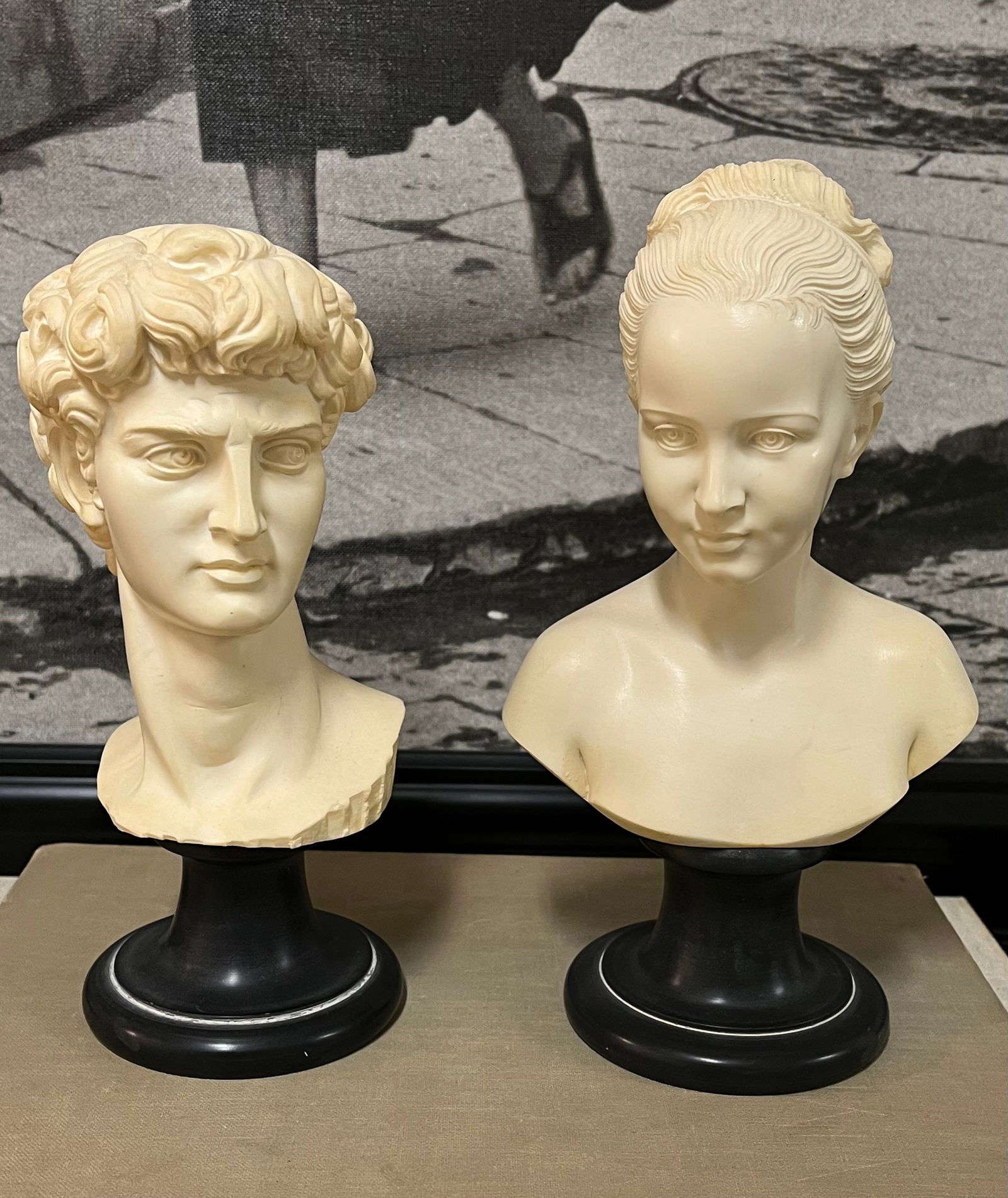 A GIANNELLI VINTAGE NEOCLASSICAL STYLE SCULPTURES: TWO VINTAGE SCULPTURES BY ARNOLDO GIANNELLI NEOCLASSICAL STYLE. SIZE: 9 INCHES APPROX. NOT MARBLE. "The pieces that the factory produces, in recomposed stone, are made of alabaster and marble powder