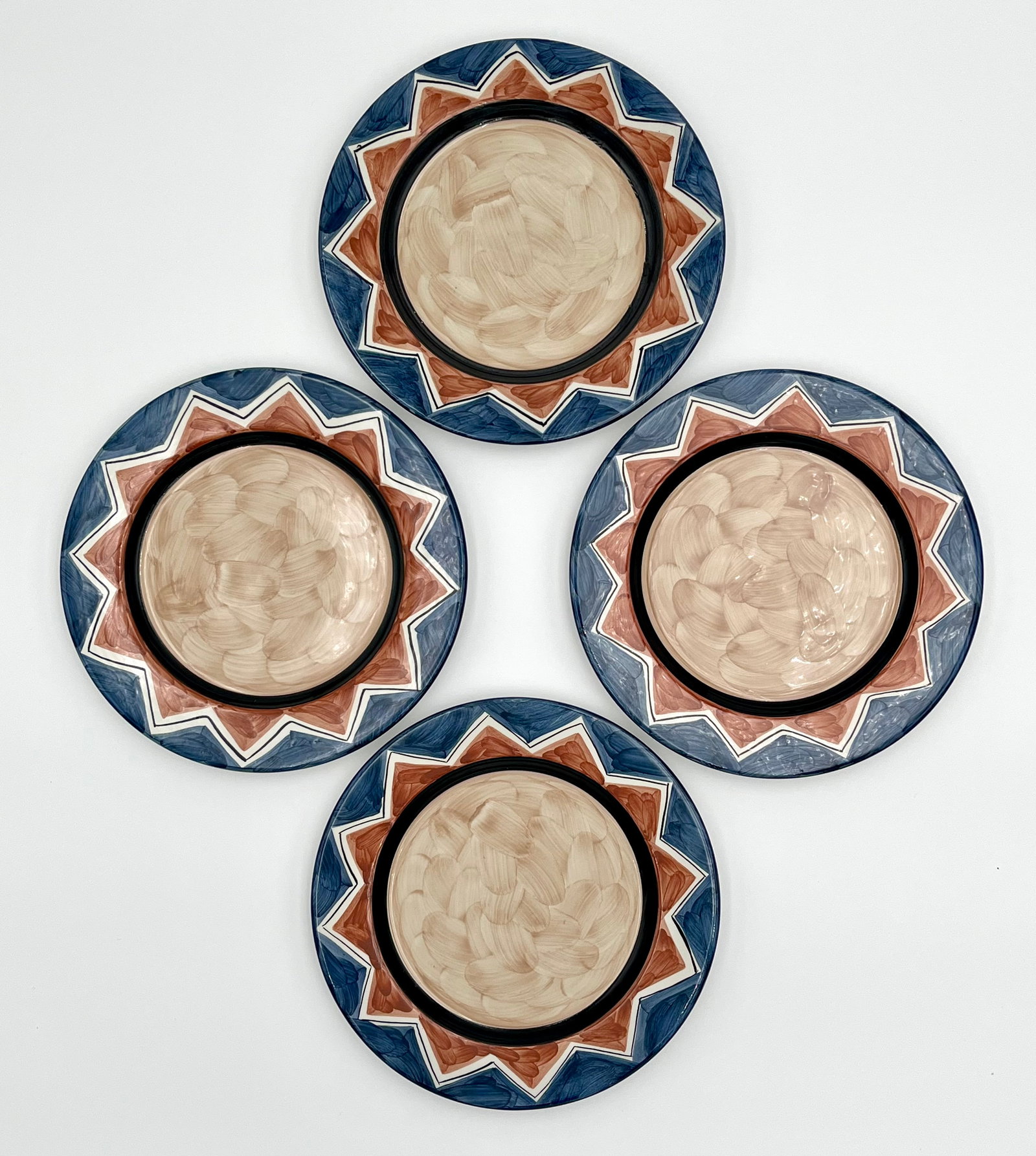 Set of 4 Vintage Alcobaca Hand-Painted Portuguese Pottery (Earthenware) Plates: Beautiful set of 4 vintage Portuguese plates by RB Alcobaça, all hand-painted with bold geometric starburst motifs.• Maker/Origin: RB Alcobaça, Made in Portugal (stamped)• Size: 8.2”