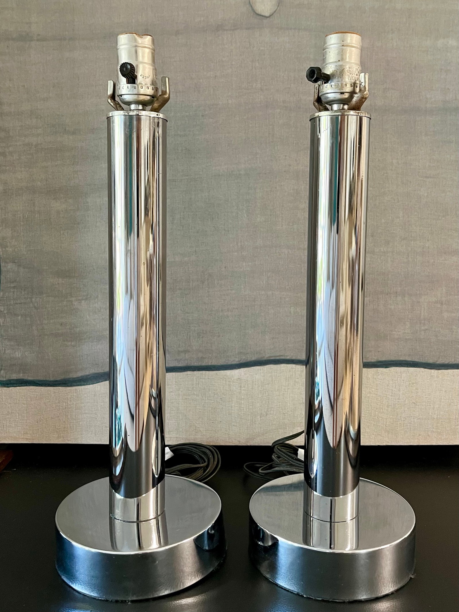 Pair Of Vintage Mid Century Modern Crome Table Lamps 16in Tall Minimalist Design: Stylish pair of vintage Mid Century Modern table lamps featuring sleek polished chrome cylindrical bases with a minimalist, modernist aesthetic. Each lamp stands 16 inches tall and includes original f