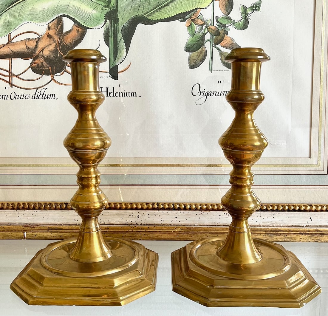 Antique Solid Brass Candlestick Holders Pair | Octagonal Base Colonial Revival: Elegant pair of antique solid brass candlestick holders featuring a classic baluster silhouette and stepped octagonal bases. They show a rich golden patina with minor surface wear consistent with age 