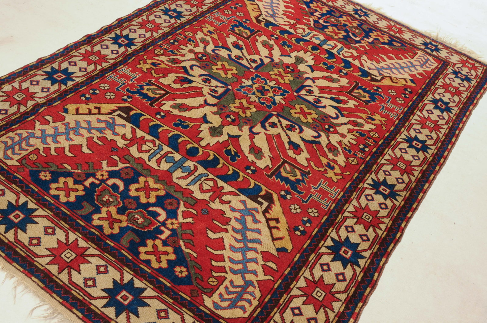 Arts of Armenia: CHALABERT (DJERABERD) OR KAZAK EAGLE RUGKarabagh, Armenia, mid-20th century.224 x 145 cm.High-quality silky wool pile on wool foundation.Very good condition.