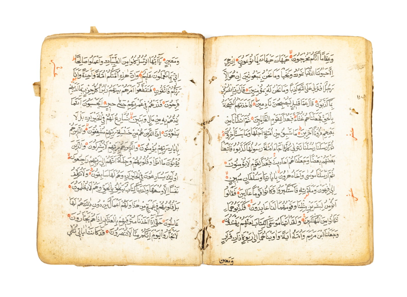 Manuscript Quran: Handwritten KoranManuscript on paper in poor condition.Leather binding with detached boards and missing spine.