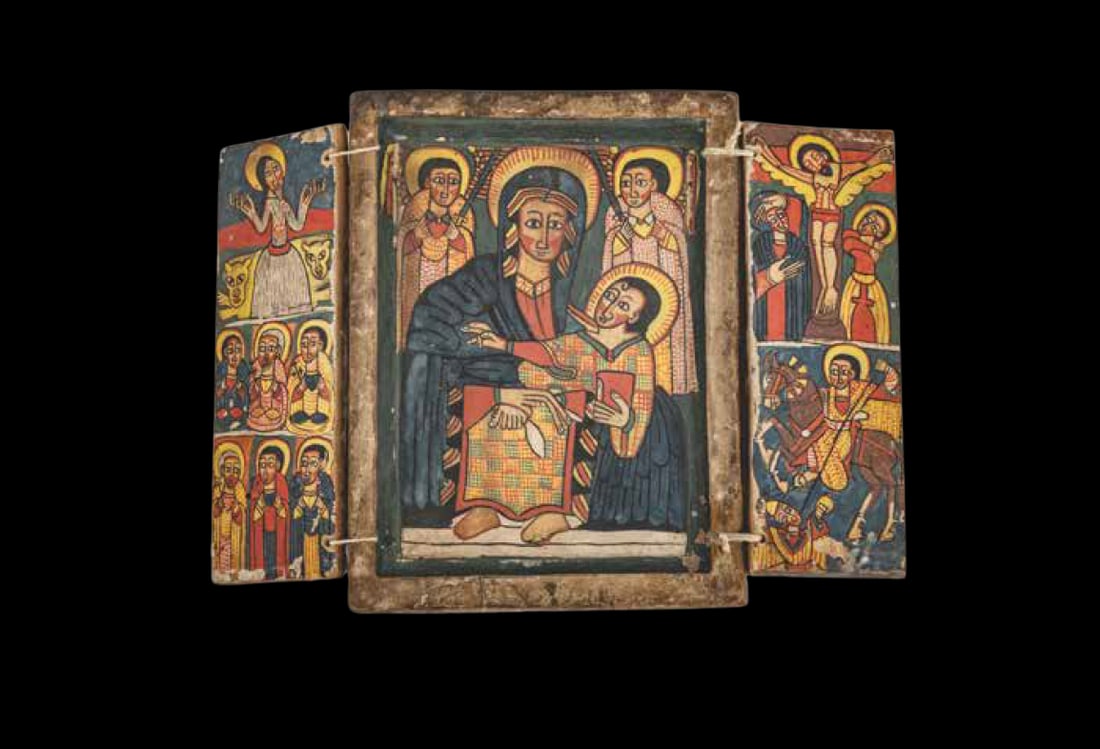 Double-sided Ethiopian triptych icon: Double-sided Ethiopian triptych iconTempera on wood panel covered with gesso.On one side, the central panel shows the Virgin and Child surrounded by archangels. On the left panel, Gabra Manfas Qeddus