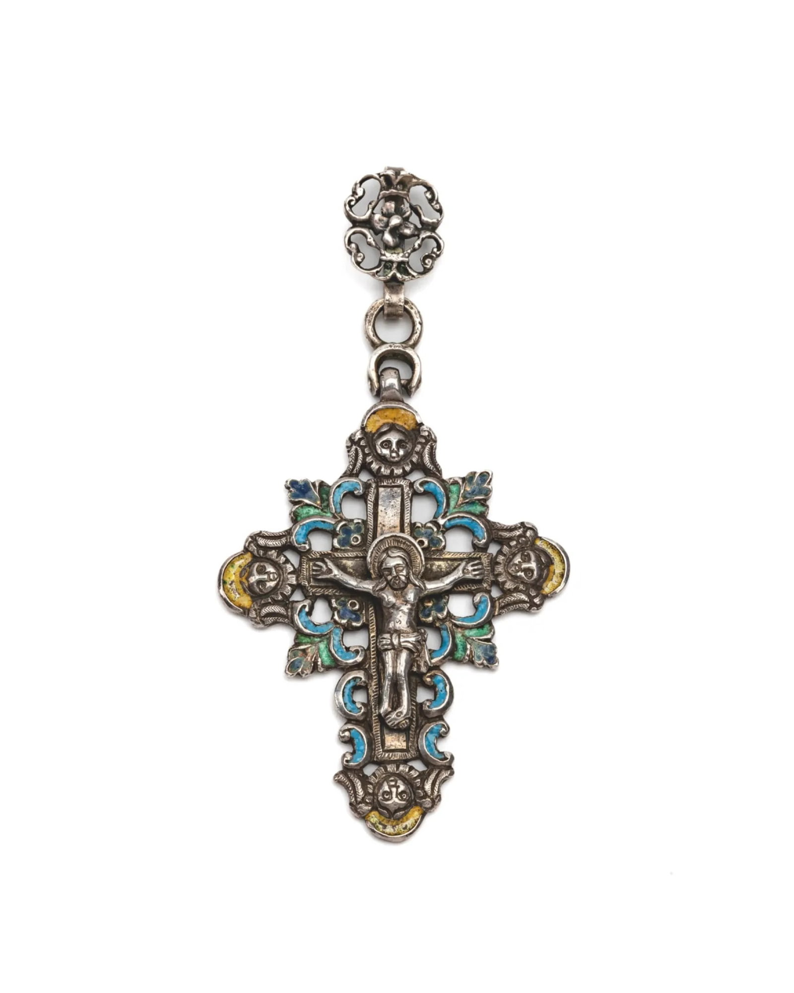 Very fine small enamelled crucifix: Beautiful small enameled crucifixBlue, green and yellow enameled silver pendant. Cross with Christ surrounded at each end of the branches by a cherub, crossed with plant motifs, the suspension chain