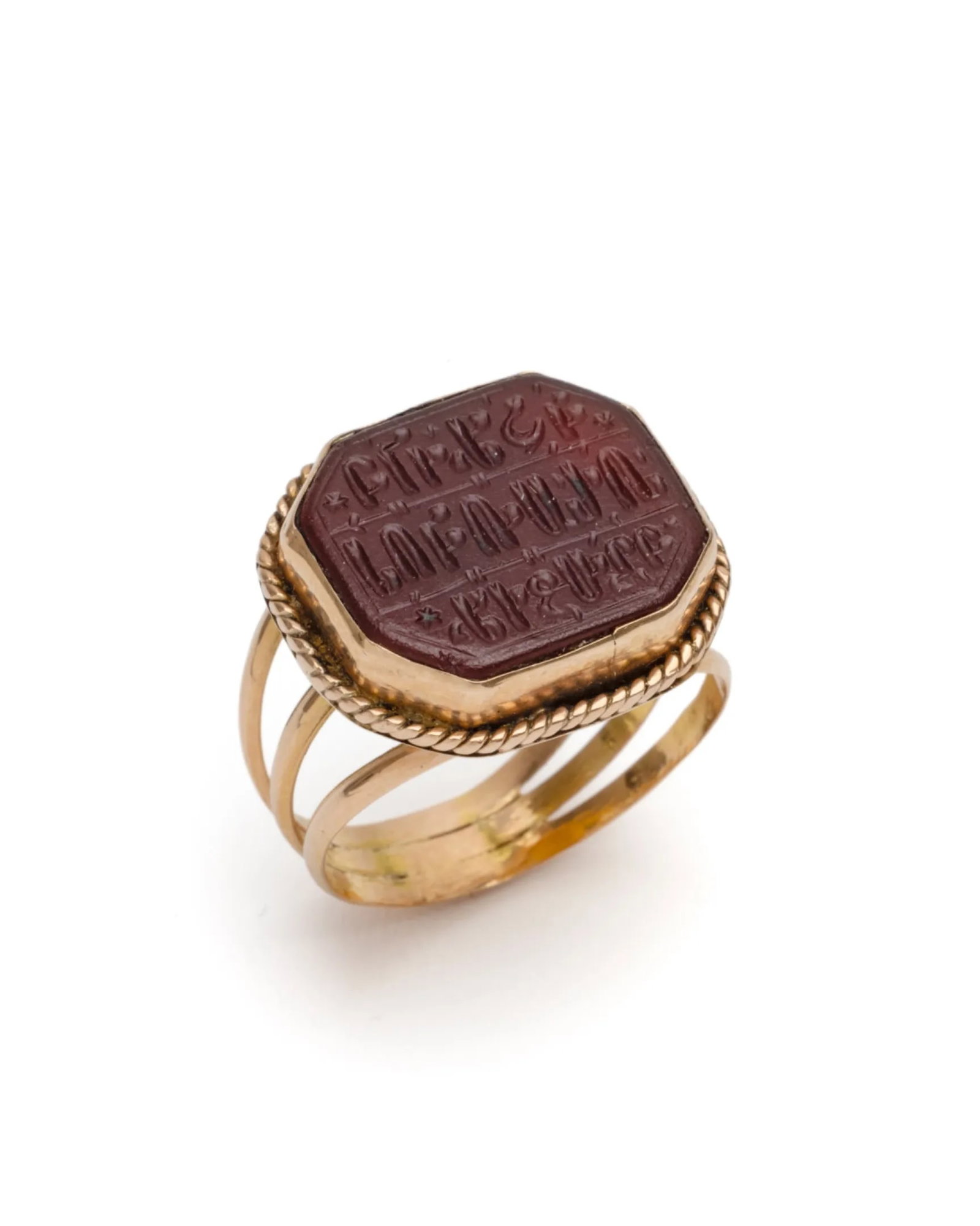 Gold signet ring with a precious intaglio…: Gold signet ring set with a precious agate intaglioThe Armenian inscription translates as: Christ's servant Mélik-Shah, son of Nersès.The name Mélik-Shah indicates that the ring belonged to