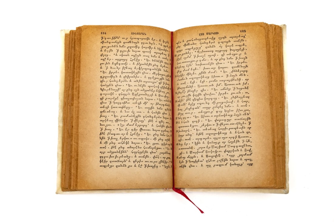 The Gospels in Armenian: Les Évangiles en arménien Printed book, s. l. n. d. (title page missing), earlytwentieth century.Bound in white velvet. Embossed silver plates on first board (Christ crucified with Passion s