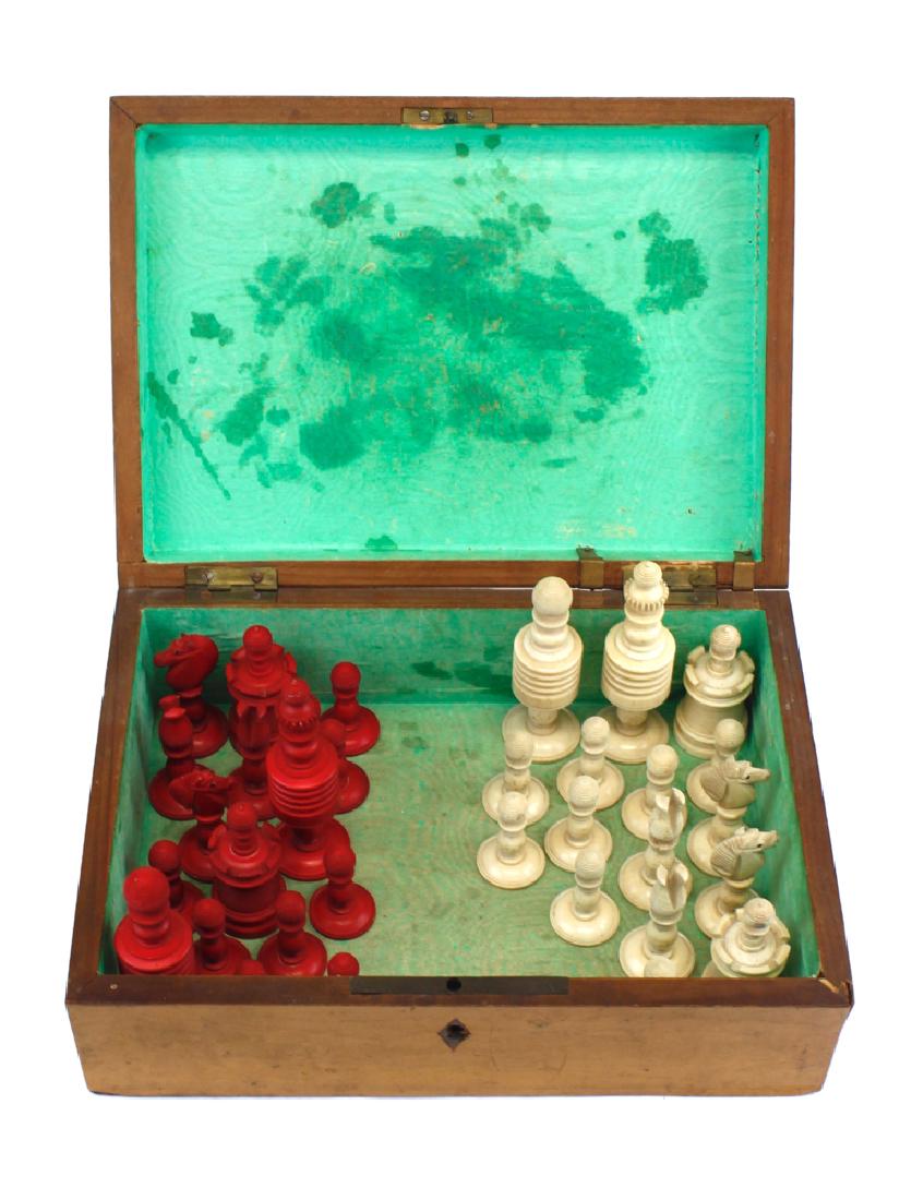 19th Century English Chess Set: 19th Century English Chess Set; A complete Antique English chess set; this chess set is cut from Kiln; dried bones. It is of the typical old english type with the pieces of one side, stained red. The