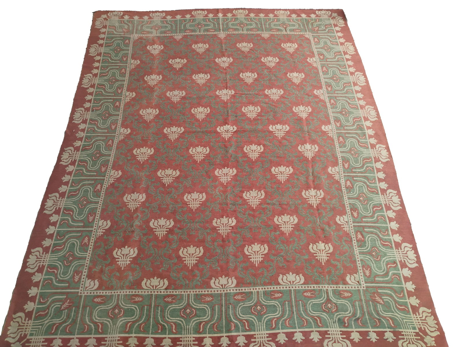 Vintage Hand Knotted Irish Rug: One large antique Irish hand knotted rug.8.5 ft. x 11 ft.All items sold as isDimensions reflect unframed art, unless stated otherwise.If pictured, frames will be provided with lots as is. We cannot gu