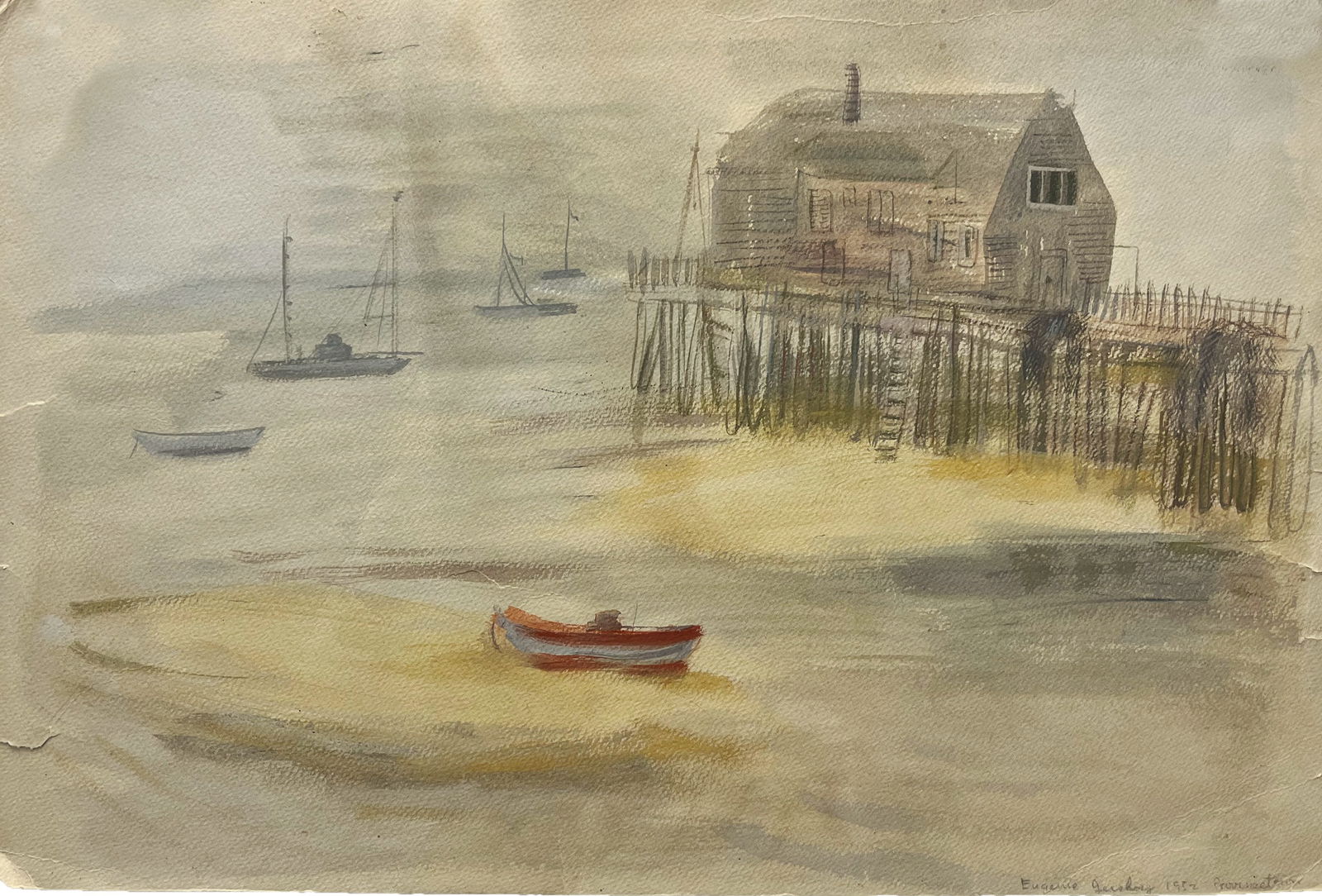 Eugenie Gershoy Watercolor with Boats and a Stilted House "Provincetown": One watercolor on paper depicting a stilted house sitting near a large body of water. Several sail boats float in the distance, as a red boat sits in the center foreground. The house is placed in the