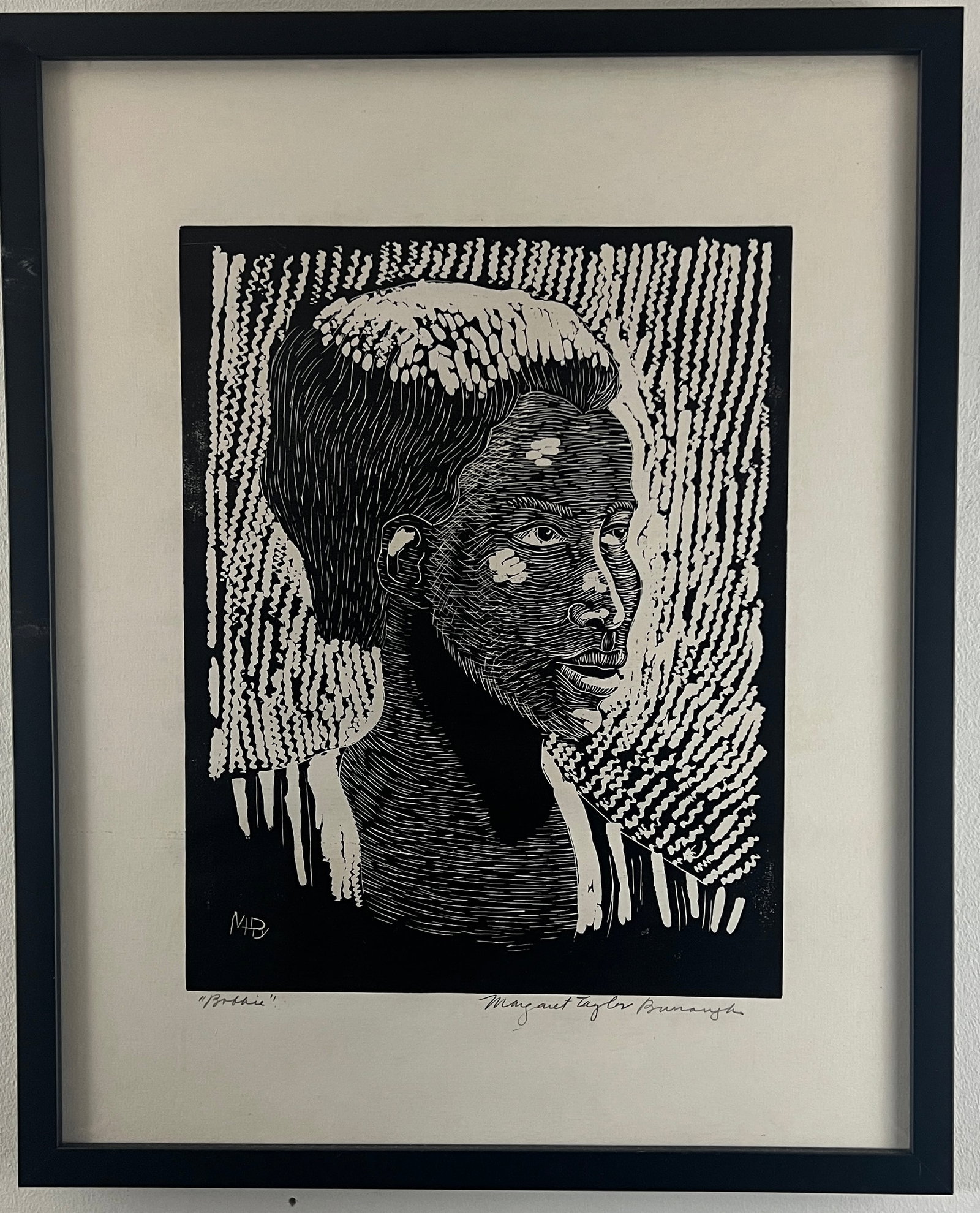 Margaret Taylor-Burroughs, Signed Woodcut on Paper: One woodcut on paper by Margaret Taylor-Burroughs (American, 1915-2010) depicting a bust portrait of a woman looking upwards. She has short hair that is slicked back, framing her face. Her features ar