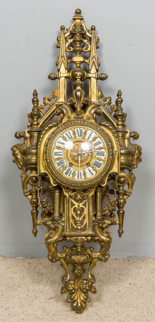 A gilt brass cased cartel clock Of large pierced (1 of 1)