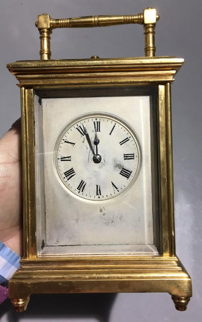 A lacquered brass cased repeating carriage clock With (1 of 7)
