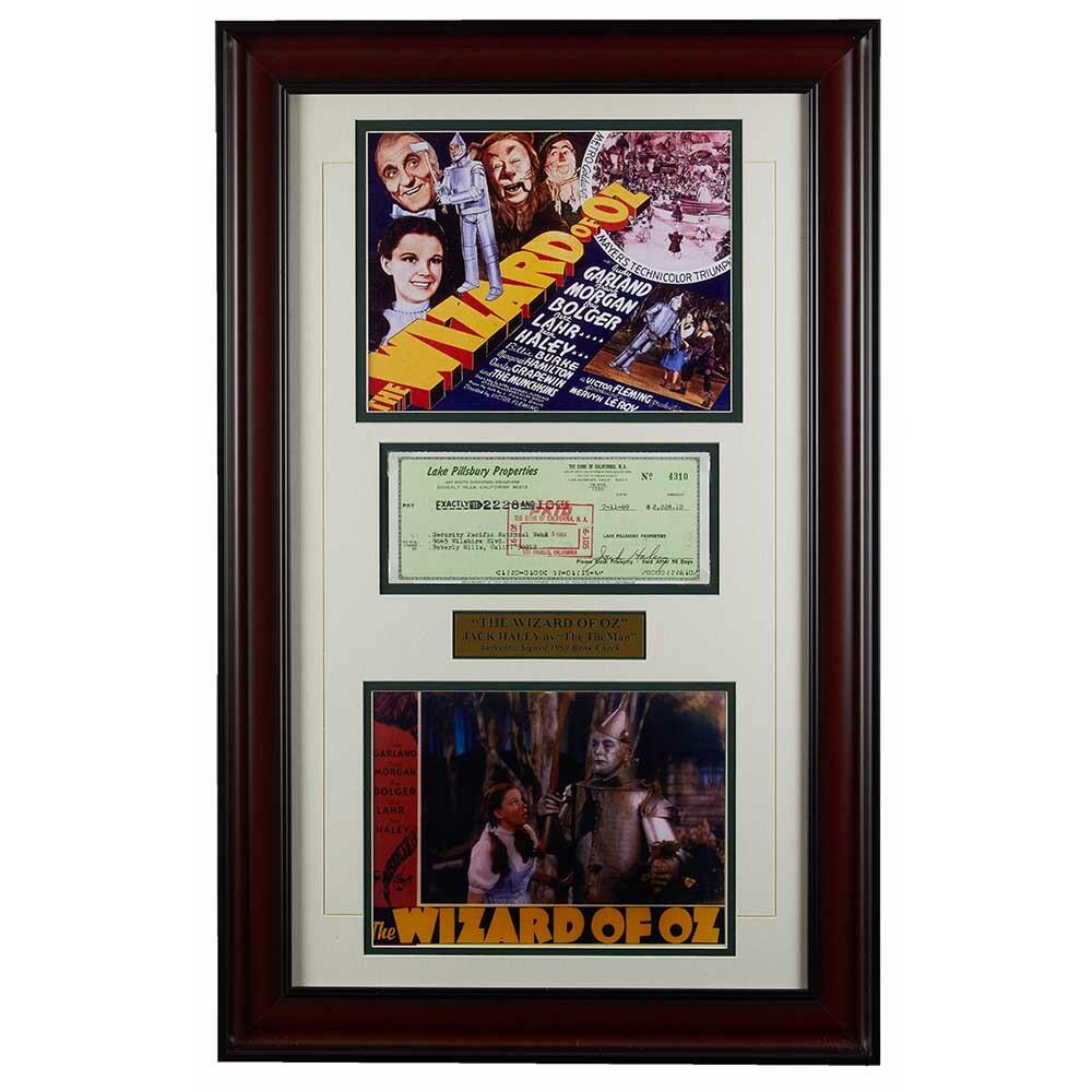 Wizard of Oz Memorabilia: Wizard of Oz Memorabilia Includes a small movie poster and scene photoBank Note signed by star Jack Haley - The Tin ManBring home this classic movie piece today!This piece comes beautifully framed and