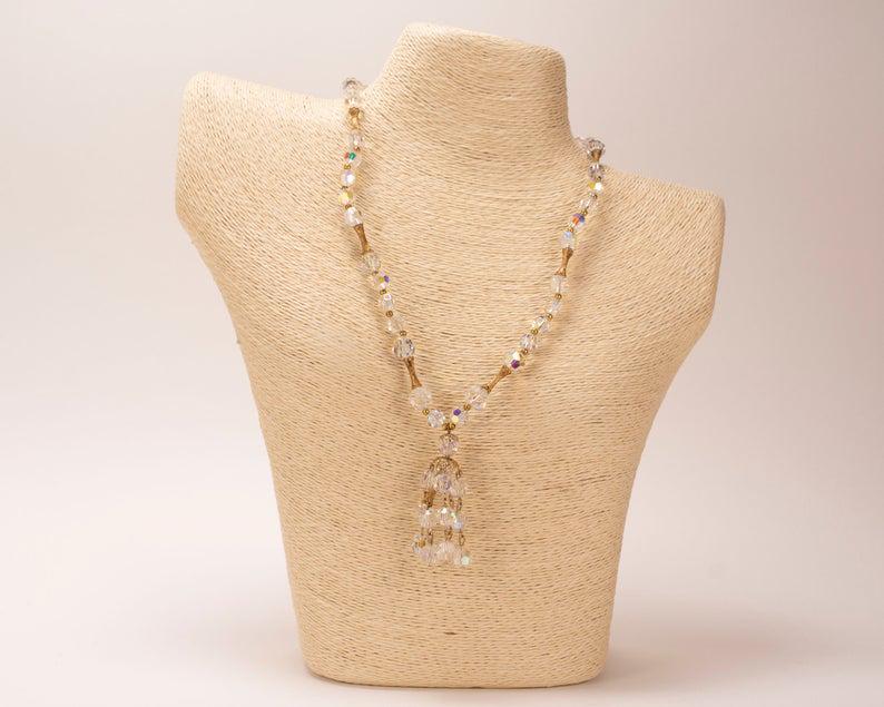Vintage Crystal Tassel Fringe Necklace: This unusual, crystal tassel necklace is in excellent vintage condition. It features faceted high quality crystals, gold filled balls and textured branch-like tube beads. The necklace is approximately