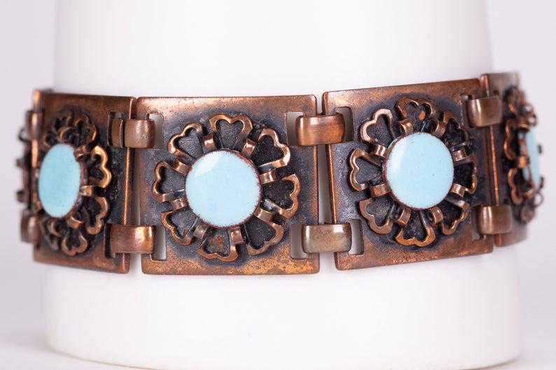 Native American Blue Enamel & Copper Bracelet: Vintage 1970's Native American Blue Enamel Flower Copper Link 8" Bracelet. This unique, circa 1970's bracelet is in excellent condition with minor surface wear and a wonderful patina to the copper. It