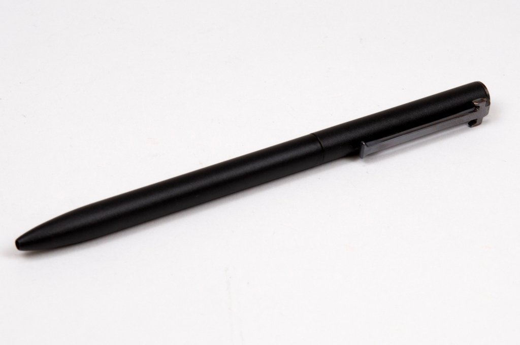 TIFFANY & CO Sterling Silver T-Clip Ballpoint Pen: Authentic TIFFANY & CO Sterling Silver T-Clip Retractable Ballpoint Pen. Approximately 5" long. Includes box and pouch. Sterling silver T-Clip, matte black barrel . Some signs of use and wear, includi