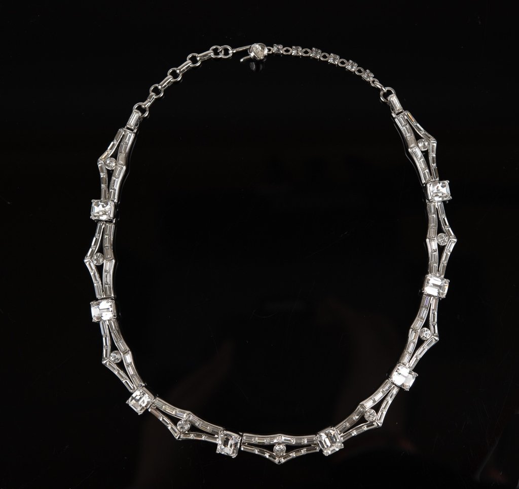 Vintage Trifari Rhinestone Choker Necklace: Item/Description: Vintage 1970’s-80’s Trifari Rhinestone Choker Necklace. Scintillating, well-made choker. Quality rhinestones channel-set baguettes, emerald cut and rounds in ribbon-like setting.