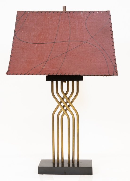 Mid-Century Lamp with Parchment Shade: Item/Description: Brass tubular lamp with black on red fiberglass parchment stitched shade. Material: N/A Dimensions: base: Length: 12"; Width: 6". Overall Height: 36". Condition: Needs to be re-wired