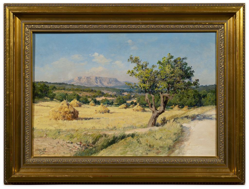 Georges Gall, Landscape Oil Painting: Item/Description: Bucolic French landscape features haystacks in an open field, mountain range in background. Signed lower left: Gall. Material: Oil on canvas. Gilt wood frame. Dimensions: Image size: