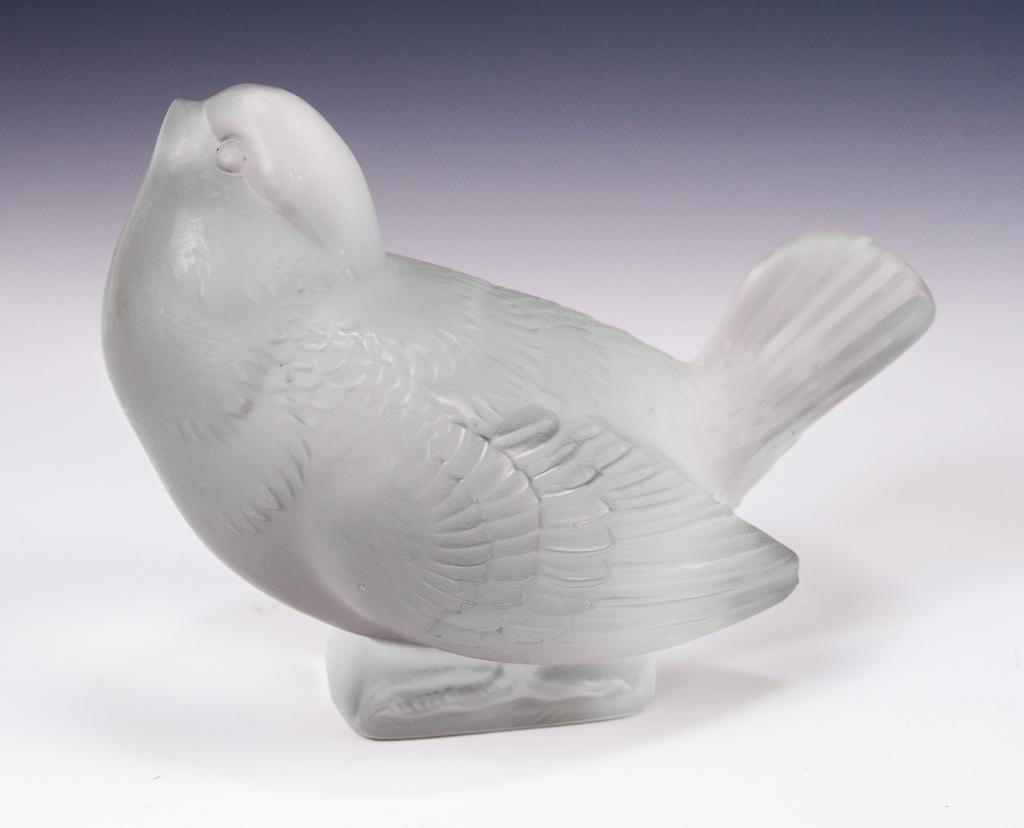 Lalique Moineau Moqueur, Sparrow Head Up: Item/Description: Signed, frosted glass bird sculpture by Lalique France. Pudgy bird is holding his head high. (Crystal, Paperweight, Collectible) Material: Glass. Dimensions: Height: 3"; Width: 4 1/2