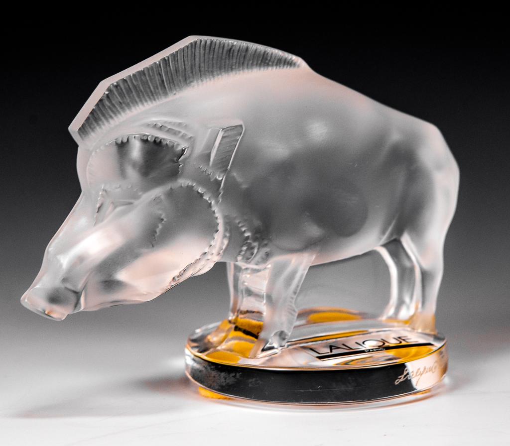 Lalique Sanglier Wild Boar Glass Sculpture: Item/Description: Presse papier "Sanglier" Warthog / Wild Boar frosted crystal figure by Lalique France. Signed on base. Includes original Lalique box and packaging as shown. (Razorback, Automobile Ma