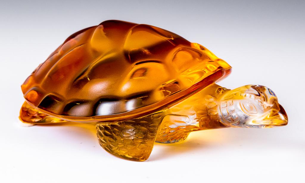 Lalique Amber Glass Sea Turtle "Caroline": Item/Description: Clear and amber crystal sculpture Tortue Caroline (sea turtle) by Lalique France. Signed on bottom. Includes original Lalique box and packaging as shown. (Tortoise, Animal Figurine, 