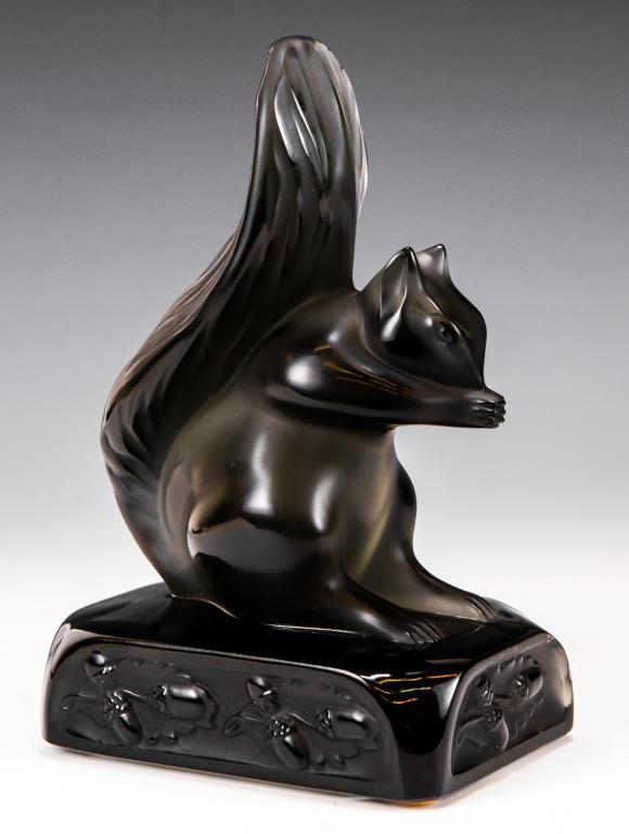 Lalique Smoky / Black Glass Squirrel Figurine: Item/Description: Squirrel sculpture in dark crystal glass by Lalique France. Features acorn motif to base. Signed on bottom. Includes original Lalique box and packaging as shown. (Art Glass, Animal F