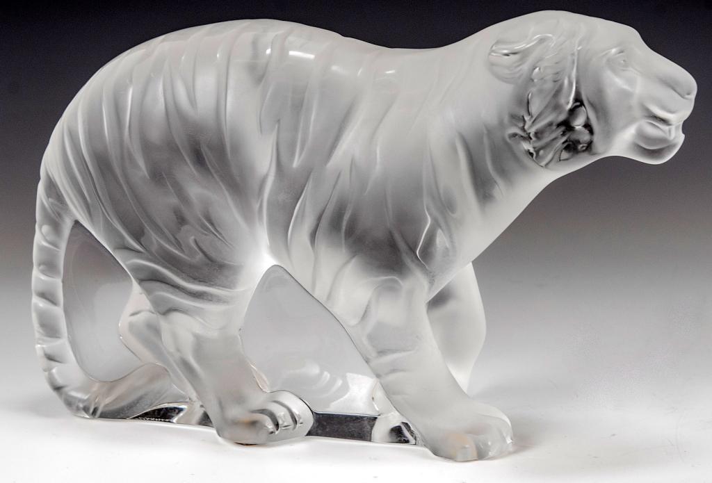 Lalique Bengale / Bengal Tiger: Item/Description: Bangale Tiger (Father Tiger, poised for attack) by Lalique France. Signed on bottom. Includes original Lalique box and packaging as shown. Material: Glass. Dimensions: Height: 6"; Wi