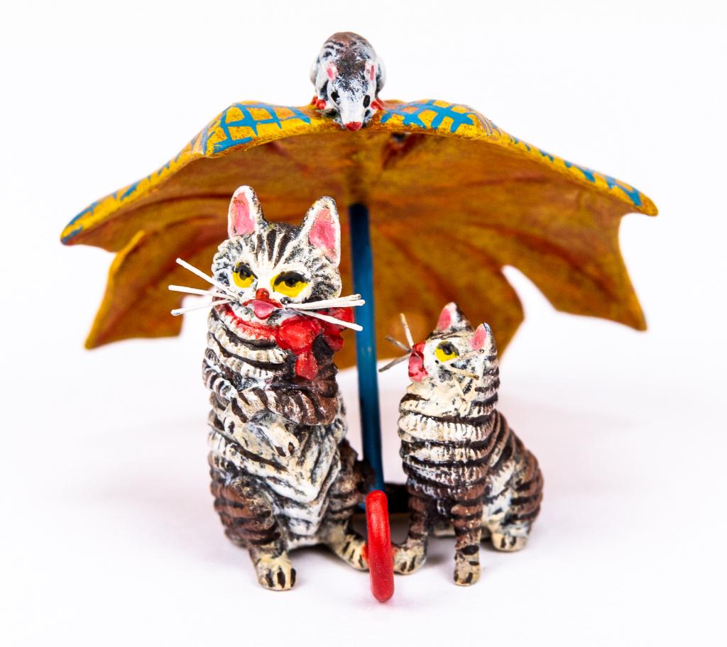 Vienna Cold Painted Bronze Cats Under Umbrella: Item/Description: Petri Bronzen Vienna cold painted bronze miniature sculpture depicting two cats under an umbrella; one looking up at a mouse. Austrian cold painted bronze. Petri Bronzen was a Vienna