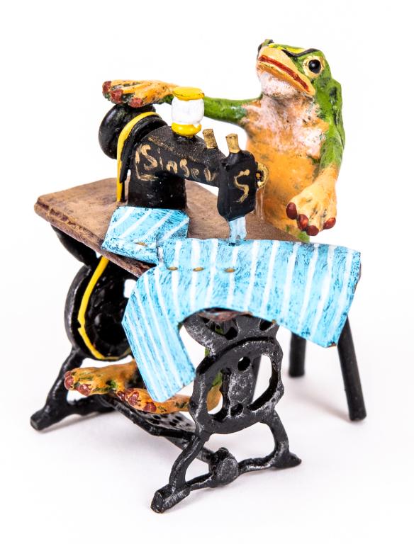 Vienna Cold Painted Bronze Frog at Sewing Machine: Item/Description: Petri Bronzen Vienna cold painted bronze miniature figurine features a frog tailor working at his sewing machine. Austrian cold painted bronze sculpture. Petri Bronzen was a Vienna b