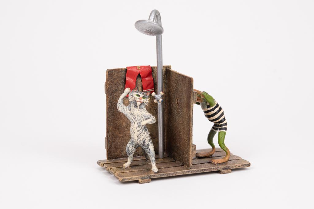 Vienna Cold Painted Bronze Peeping Frog: Item/Description: Vienna cold painted bronze miniature figurine features a naughty frog spying on a showering cat. Austrian cold painted bronze sculpture. Marked on bottom. Material: Bronze. Dimension