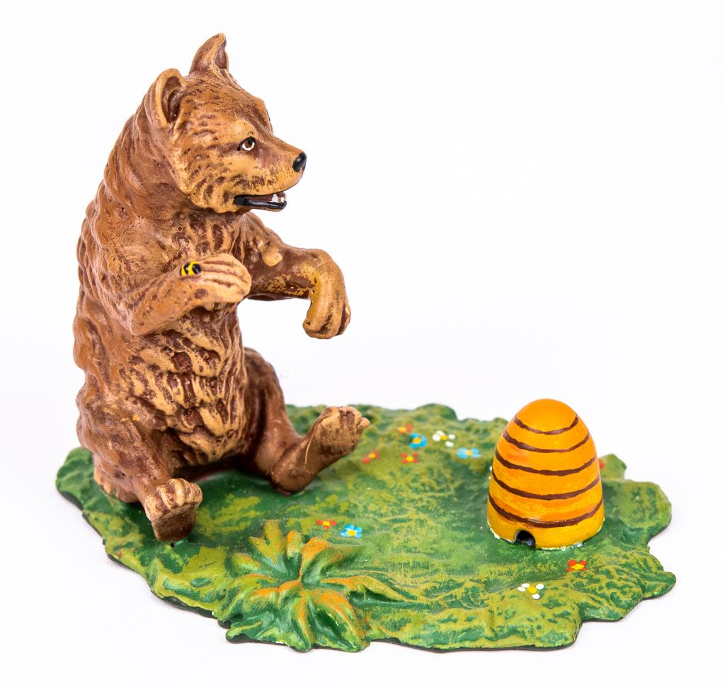 Vienna Cold Painted Bronze Bear with Beehive: Item/Description: Petri Bronzen Vienna cold painted bronze miniature figurine features a bear sitting near a beehive. Austrian cold painted bronze sculpture. Petri Bronzen was a Vienna based company a