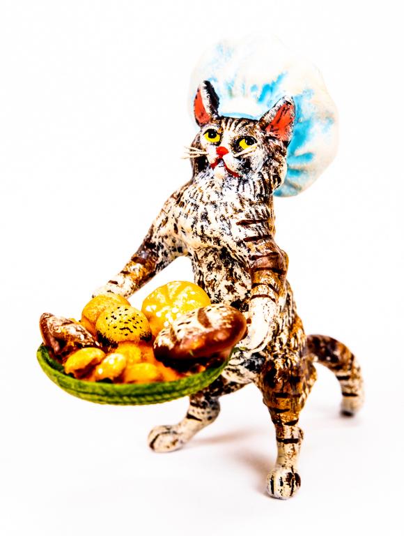 Vienna Cold Painted Bronze Cat Baker: Item/Description: Petri Bronzen Vienna cold painted bronze miniature figurine features a cat wearing a baker cap carrying a basket of baked goods. Austrian cold painted bronze sculpture. Petri Bronzen