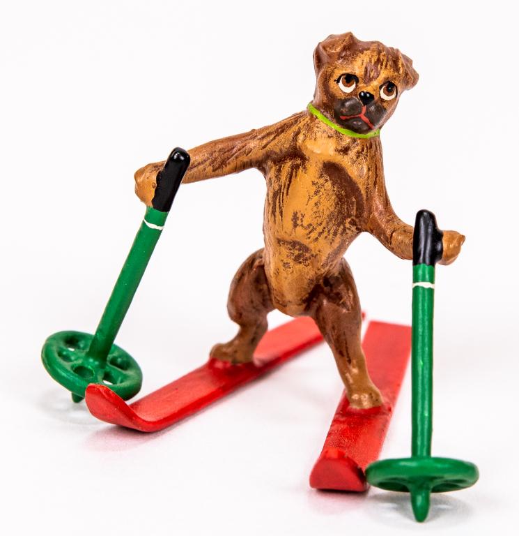Vienna Cold Painted Bronze Skiing Dog: Item/Description: Petri Bronzen Vienna cold painted bronze miniature figurine features a pug in skis. Austrian cold painted bronze sculpture. Petri Bronzen was a Vienna based company and maker of fine