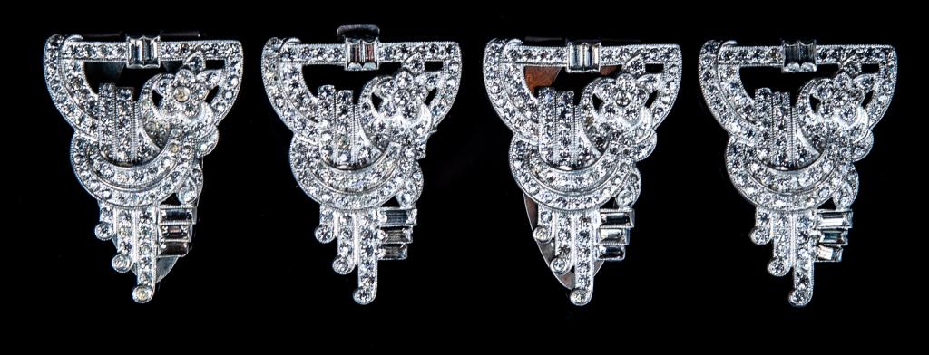 Art Deco Rhinestone Dress Clips & Buckles: Item/Description: Wonderful Art Deco sparkly suite of matching dress clips and buckles. Rhinestone encrusted geometric shapes, swirls and flowers. Each hallmarked with letter R in square frame. Materi