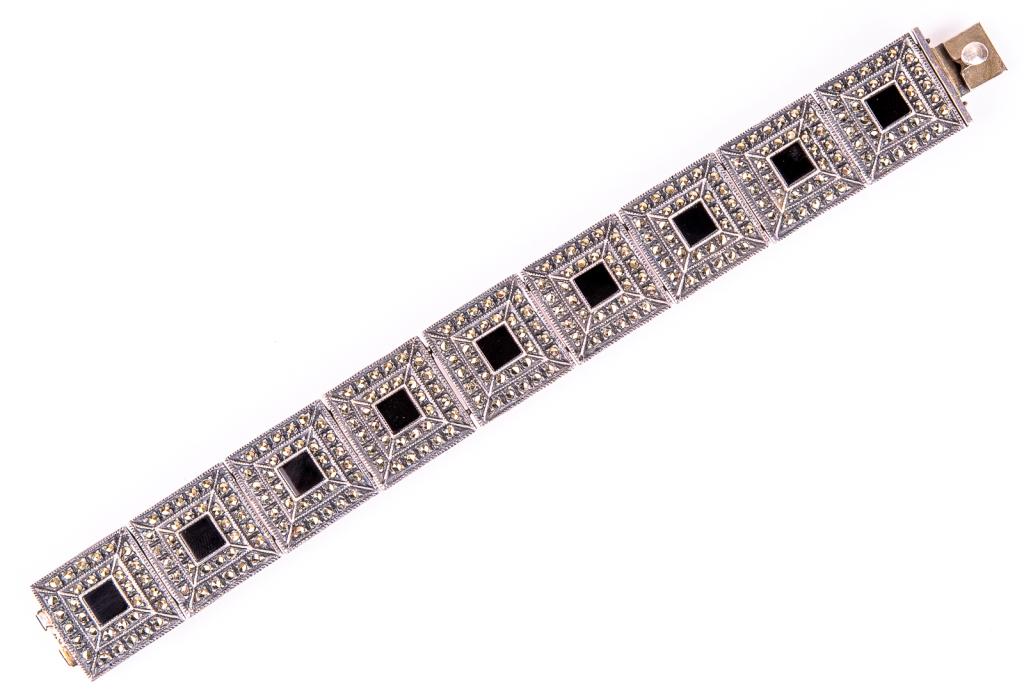 Judith Jack Sterling, Onyx & Marcasite Bracelet: Item/Description: Geometric, Sterling Silver bracelet features nine stepped panels inlaid with marcasites and slices of onyx. Push-in clasp. Exquisite workmanship and detail. Art Deco design. Hallmark