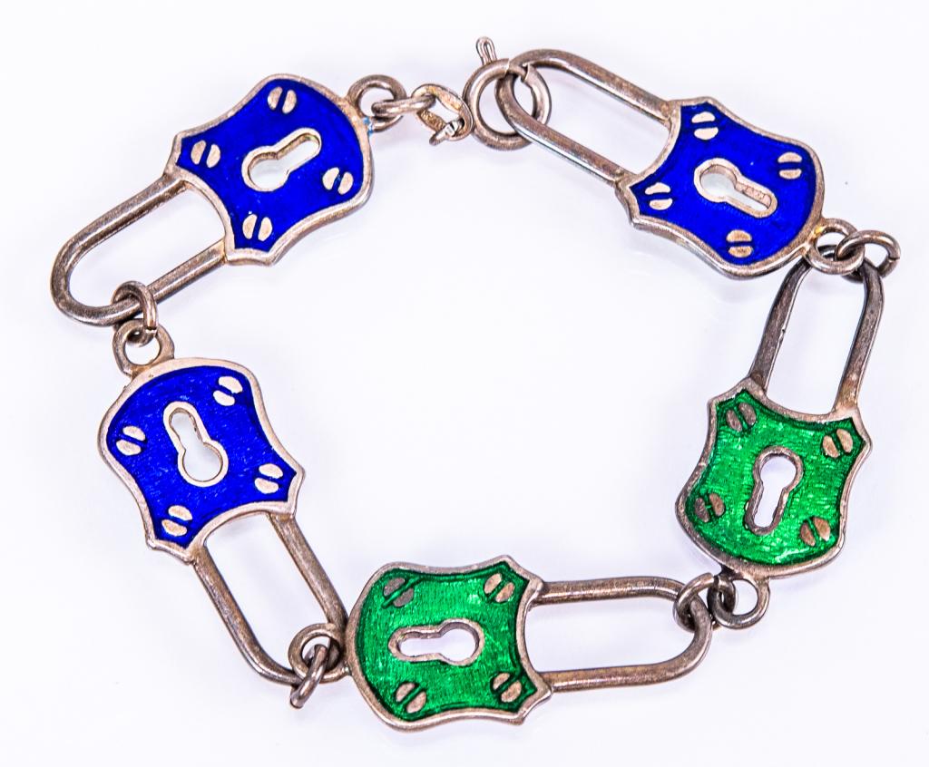 Sterling & Guilloche Enamel Padlock Bracelet: Item/Description: Rare, Sterling Silver two-tone guilloche enamel bracelet. Double sided padlocks in bright blue and green enamel. Unique design. Unmarked. Spring ring closure. Hallmarked in part: 925
