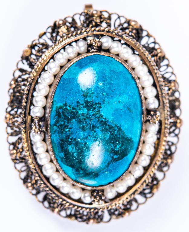 Estate Sterling Turquoise & Pearl Pendant Pin: Item/Description: Exquisite Middle Eastern brooch pendant has bezel set, domed rich blue Turquoise. Ringed by seed pearls and silver florettes. Elalborate gilt wash lacy filigree Silver mounting, ball