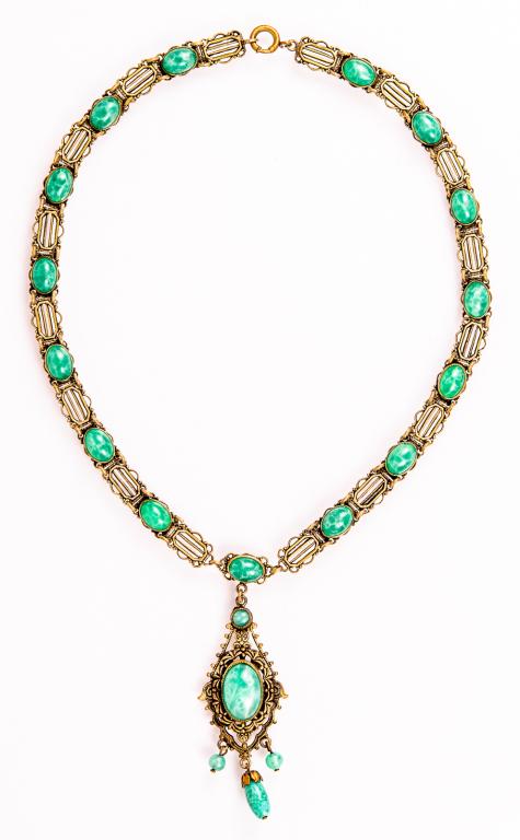 Art Deco Peking Glass Pendant Necklace: Item/Description: Rare Art Deco Peking glass lavaliere necklace. Czechoslovakian made in Egyptian revival design. Dragon's Egg art glass (Peking glass) oval cabochons bezel set in gilt brass, alternat