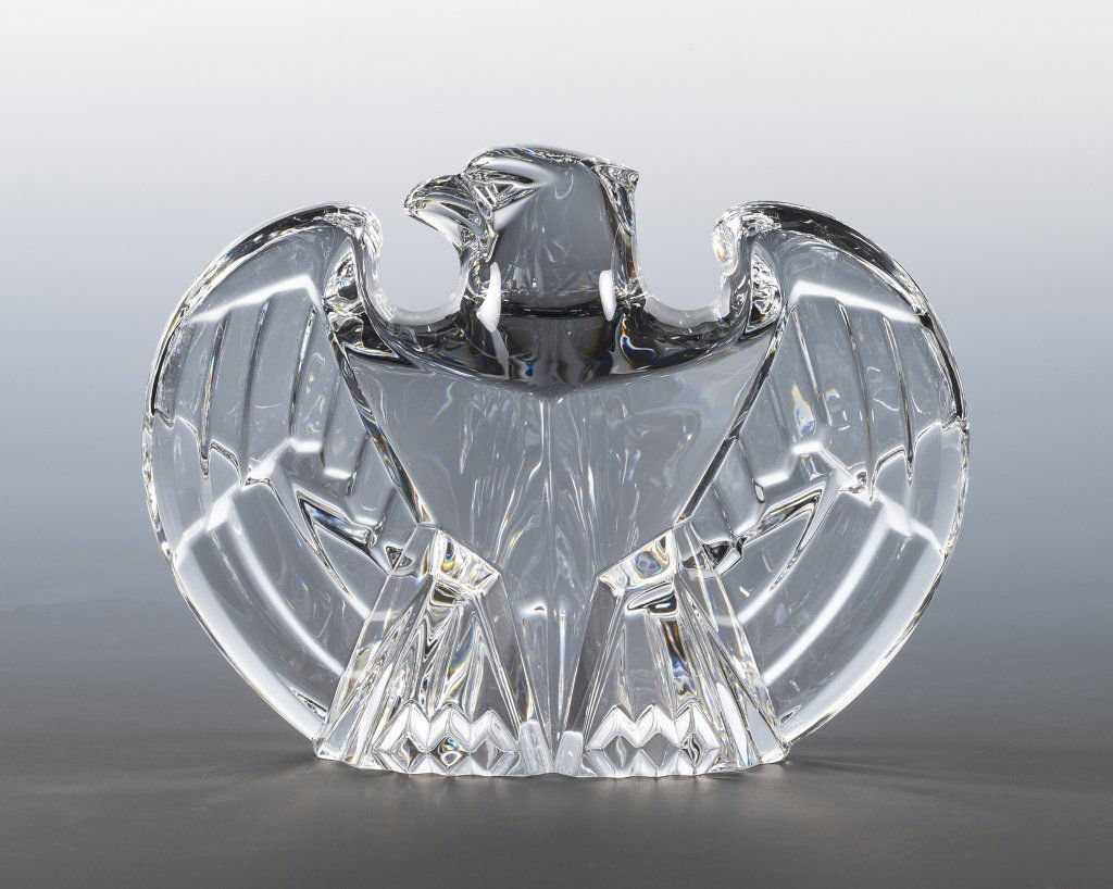 Steuben Crystal Lloyd Atkins Eagle: Item/Description: Art glass sculpture of an American Bald Eagle designed by Lloyd Atkins in 1984. Signed. Material: Glass. Dimensions: Height: 3"; Width: 4". Condition: Minor surface wear. No noticeab