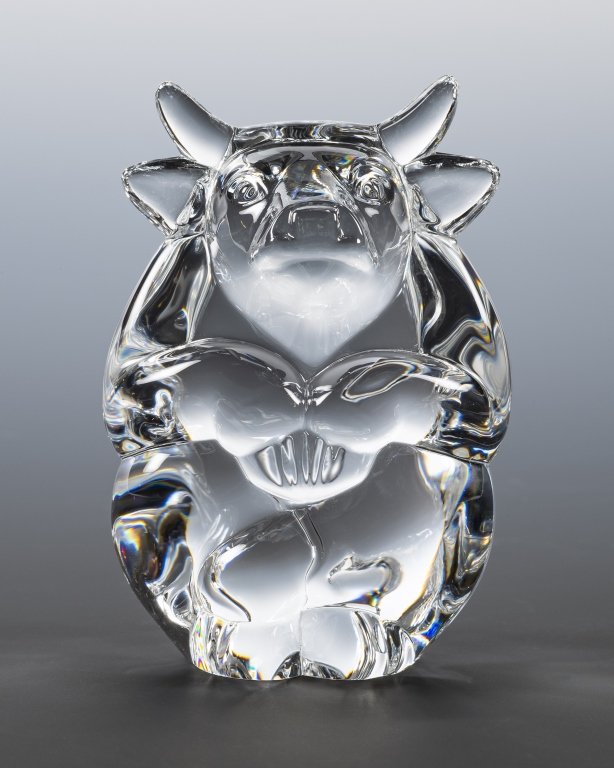 Steuben Glass Bull Hand Cooler, Lloyd Atkins: Item/Description: Crystal sitting bull hand cooler designed by Lloyd D. Atkins for Steuben. Signed. (Animal, Collectible, Taurus) Material: Glass. Dimensions: Height: 2 1/2"; Width: 1 1/2". Condition: