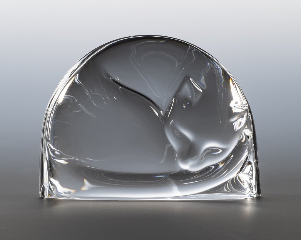 Steuben Crystal Figurine, Cat Nap: Item/Description: Art glass sculpture features napping cat. Signed. (Paper weight, Collectible) Material: Glass. Dimensions: Height: 2 1/2"; Width: 3". Condition: Minor surface wear. No noticeable chi
