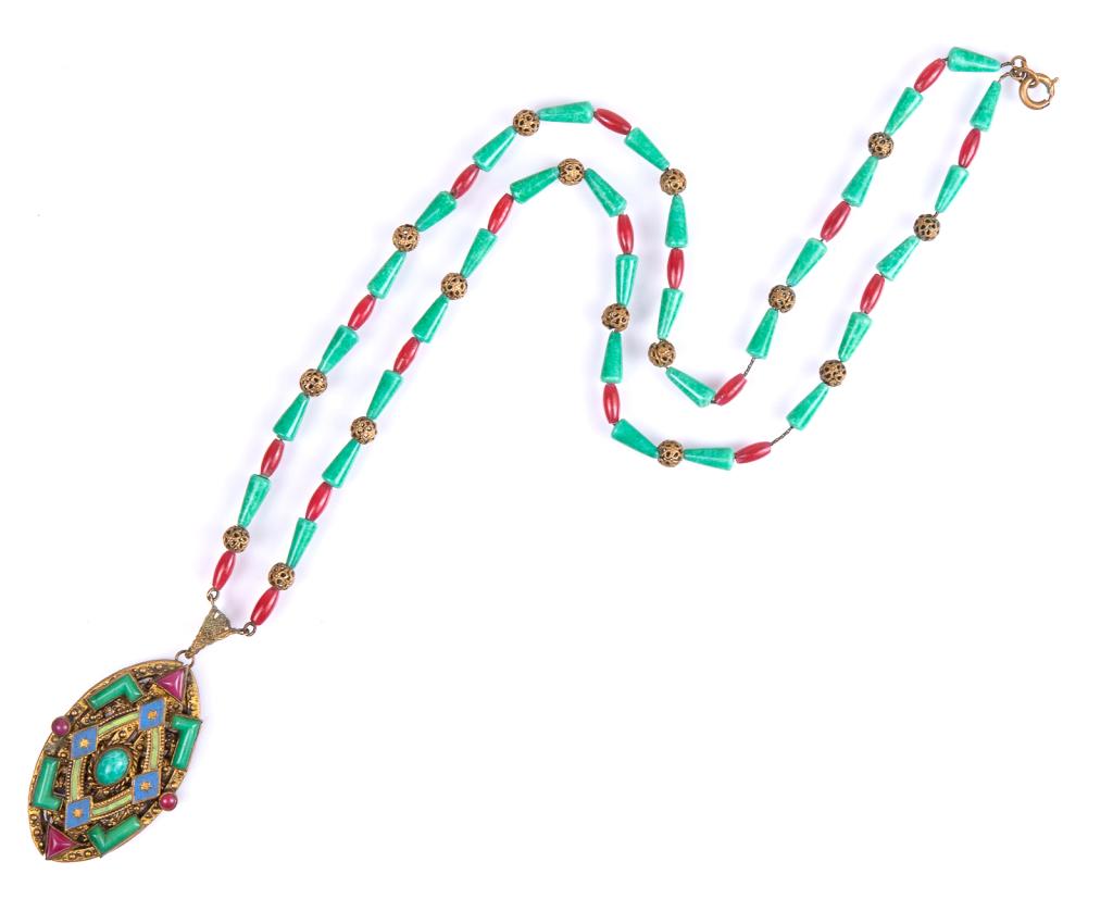 Czechoslovakian Peking Glass Brass Necklace: Item/Description: Masterpiece Art Deco Czechoslovakian lavaliere necklace fashioned from brass, polished Peking glass beads in green and deep rose threaded onto a delicate chain, interspersed by filig