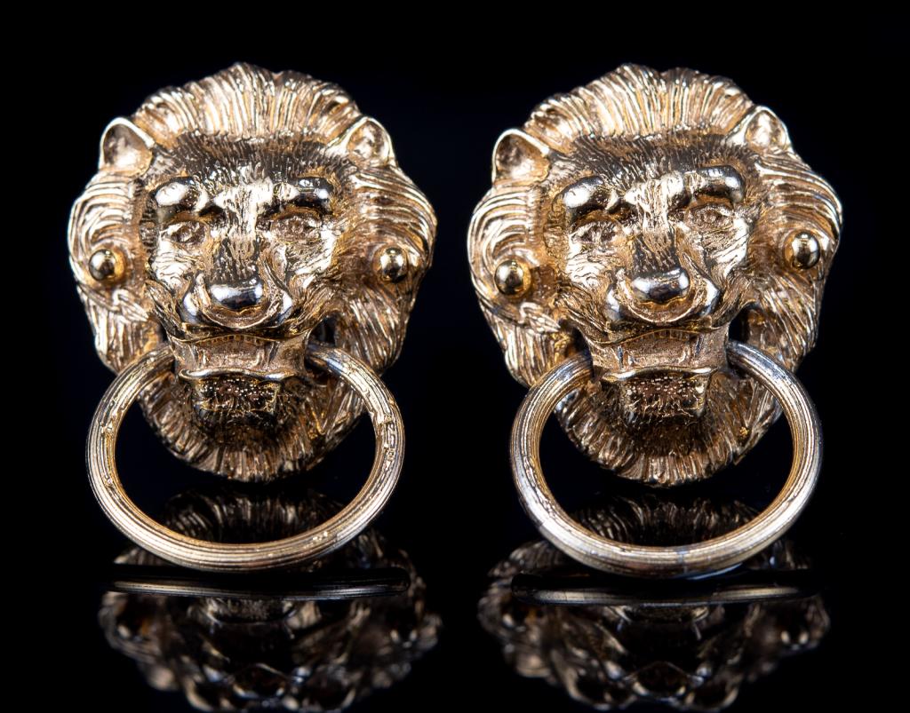 Vintage David Hill Lion Head Clip Earrings: Item/Description: Signed, sculptural lion's head door knocker clip-on earrings in shiny gold tone metal by designer, David Hill ( owner and designer of Ciner). Great detail and design. Hanging rings/k