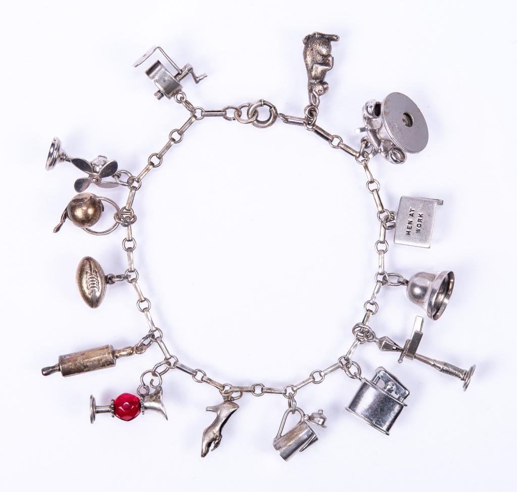 Vintage Sterling 14 Charm Bracelet (1 of 11)