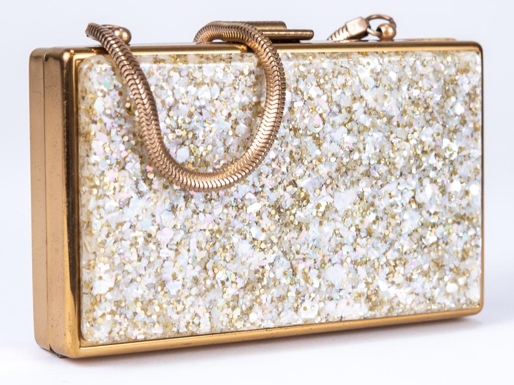 Vintage Confetti Lucite Minaudiere Box Bag: Item/Description: Two chambers for powder/rouge with applicators; mirrored compartment lifts to reveal a space for handkerchiefs ( roses hanky included!); tubular lipstick holder contains a miniature 