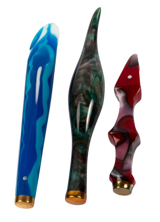 Ming-Kahuna Pipe Tampers: Item/Description: Three Ming-Kahuna pipe tampers in various shapes and colors. Includes leather pouch. From their website: "Ming-Kahuna was founded nineteen years ago based upon a single core premise: