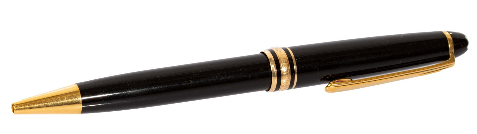 Montblanc Meisterstuck Black Ballpoint Pen: Item/Description: Elegant and sleek ballpoint pen by Montblanc Meisterstuck of Germany. Black resin, gold plated hardware and accents. Twist mechanism. Hallmarked around band: Montblanc- Meisterstuck.