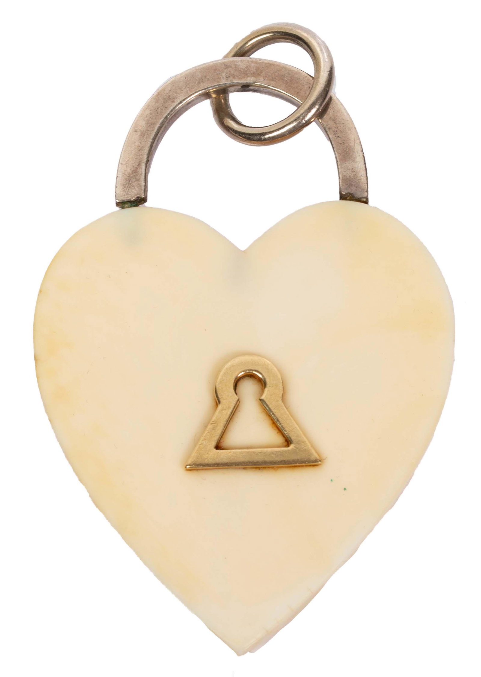 14K & Sterling Love Heart Bone Padlock Pendant: Item/Description: Unique studio artisan heart pendant made from ox bone and set with a 14K yellow gold key hole accent and curved Sterling Silver padlock set into heart. Simple O-ring bale. Unusual an